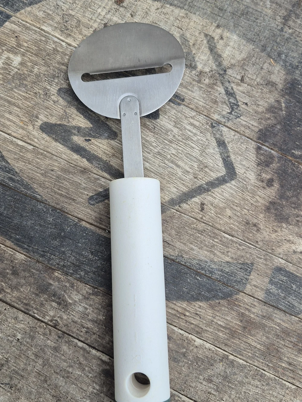 Tupperware White and Teal Stainless Cheese Slicer